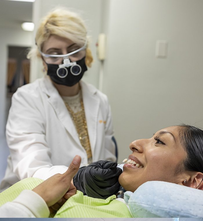 Dental patient having teeth shade-matched in Springfield