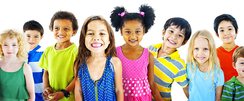 The image features a group of children posing together, with varying skin tones and hair colors, all smiling and looking directly at the camera.